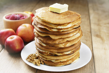 Fototapeta na wymiar Pile of pancakes in the white plate