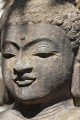 Fototapeta na wymiar Bouddha de pierre
