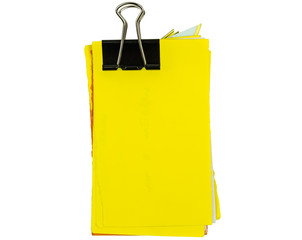 untidy yellow notepad with binder
