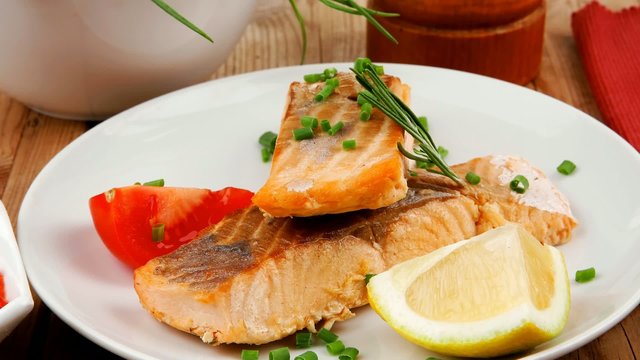 savory sea fish : baked salmon strips dish with red caviar over 