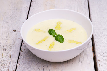 cream of asparagus soup, beans, fresh basil leaf