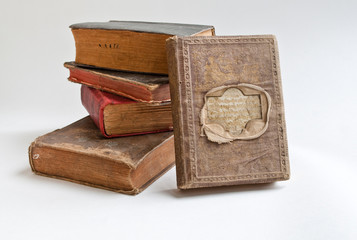Old books on a white background.