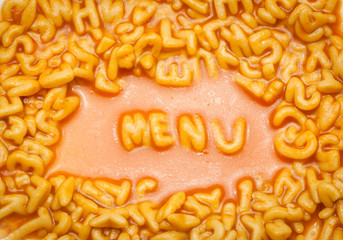 menu spelt with spaghetti letters on a plate