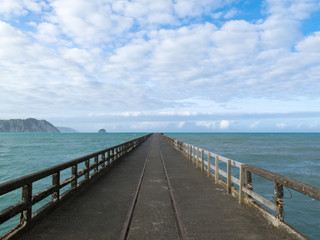 Fototapeta na wymiar Tolaga Bay Wharf the longest pier of New Zealand