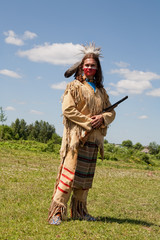 North American Indian in full dress. Reconstruction