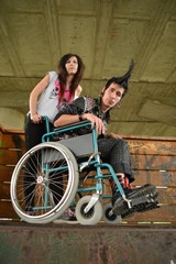 Obraz na płótnie Canvas vie en fauteuil roulant