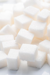 plenty of white sugar cubes backlit