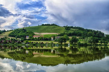 Fototapeta na wymiar A small hill and a lake.