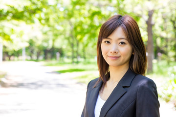 asian businesswoman in the park