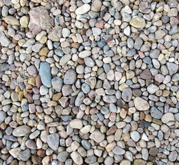background made of a closeup of a pile of pebbles