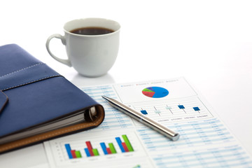 Business report with cup of coffee