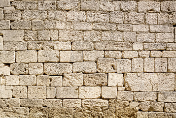 Ancient wall built of white stone