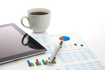 Business report with cup of coffee