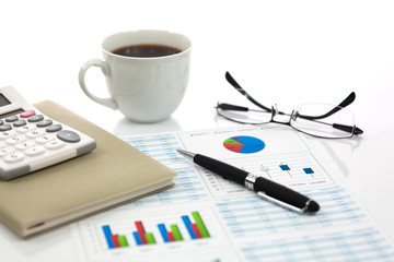 Business report with cup of coffee