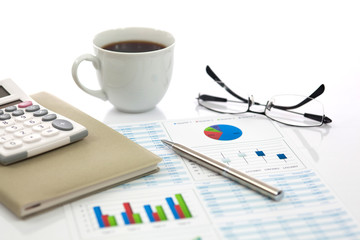 Business report with cup of coffee