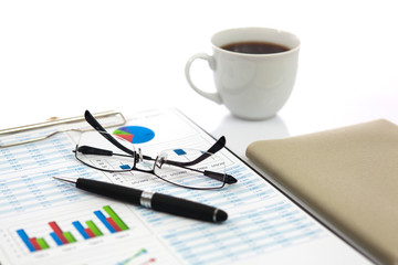 Business report with cup of coffee