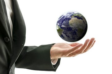 Businessman holding globe