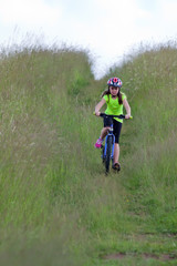 Fototapeta premium Teens girl on bike