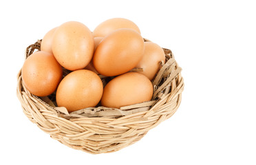egg in basket isolated on white background