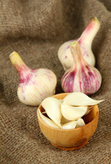 Fresh garlic, on sackcloth background