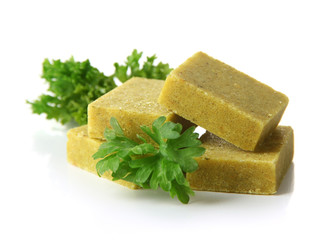 Bouillon cubes with parsley, isolated on white