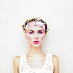 Sensual fashion girl with flowers in their hair