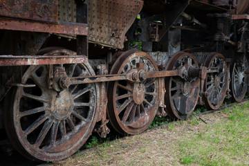 Fototapeta na wymiar rusty steam locomotive wheels