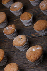 Cupcakes on wooden table still life