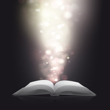 Blank book with blurred lights