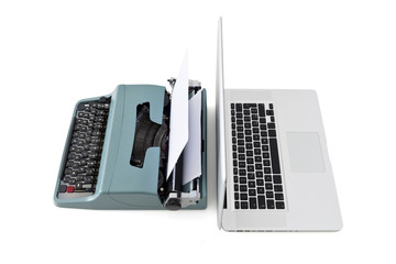 contemporary laptop vs old typewriter