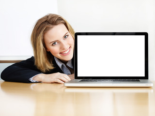 Business woman presenting her laptop with copyspace