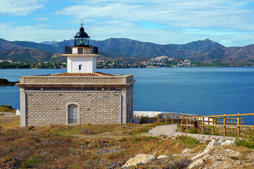 Fototapeta na wymiar Lighthouse on the Mediterranean coast, Costa Brava near Puerto de la Selva, Girona, Spain