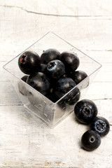 blueberries inside glass jar