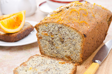 orange cake with poppy seeds, dried apricots, walnuts and honey