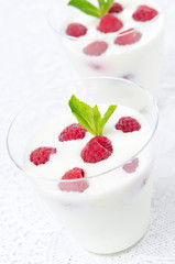panna cotta with fresh raspberries close-up
