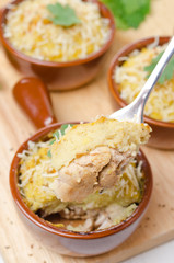 portioned form with baked chicken with mashed cauliflower