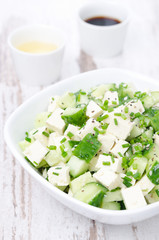 salad with cucumber, tofu and sesame seeds