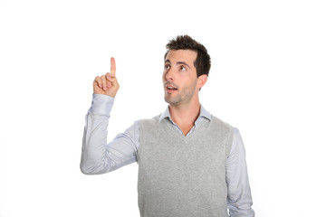 Cheerful guy showing text on white background