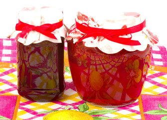 Jar with strawberry jam isolated