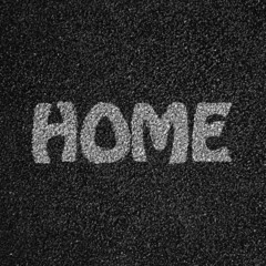 Asphalt texture or background with the word home write on it