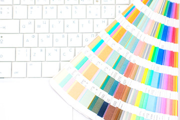 Digital printing concept, pantone palette with computer keyboard