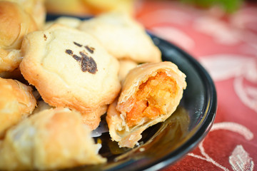 Chicken curry puff on a dish