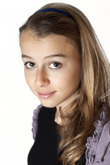 Fototapeta premium beautiful teenage girl smiling and looking into the camera.