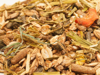 basic muesli  with herbs for horse background. close up