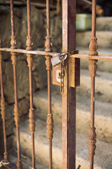 rusted locked gates