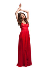 Naklejka premium Beautiful female fashion model posing in red dress