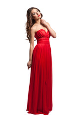 Beautiful female fashion model posing in red dress