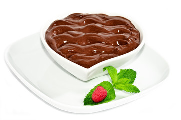 chocolat dessert whit raspberry and green leaf