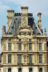 Fototapeta na wymiar Fragment of the Louvre - the royal palace in Paris.