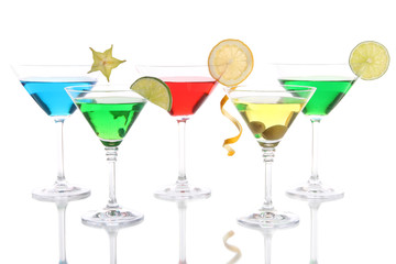 Alcoholic cocktails in martini glasses isolated on white